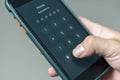 Hacking mobile phone with a password to access a smartphone, security threats online Phone lock code. Smartphone protection with
