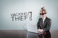 Hacking thief text with vintage businessman using laptop Royalty Free Stock Photo