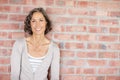 She had a great sense of humor. A cropped shot of a beautiful woman standing outside.