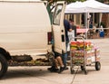 A farmer unloads his fruit that he will sell at today`s farmer`s market in this small New Jersey town Royalty Free Stock Photo