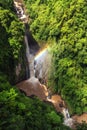 haew narok waterfall with rainbow from top view