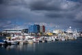 Hafnafjordur fishing harbour in Iceland - small boats and colourful port buildings.