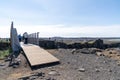 Tourists on the Bridge Between the Continents in iceland