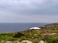 Hagar Qim and Mnajdra prehistoric temple complex with canopy, megalith temple under protective tent on the Mediterranean island of