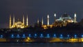 Hagia Sophia and Blue Mosque timelapse at night reflected in Bosphorus water. Istanbul, Turkey Royalty Free Stock Photo