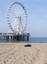 The Hague, Februari 18 2019: Scheveningen, The Hague, The Netherlands. Ferris wheel and a bungy tower on the pier of