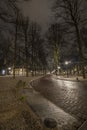 The Hague - February 18 2019: The Hague, The Netherlands. Park and street in The Hague at dusk, long exposure, wet