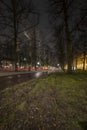 The Hague - February 18 2019: The Hague, The Netherlands. Park and street in The Hague at dusk, long exposure, streaks