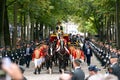 THE HAGUE, HOLLAND - SEPTEMBER 17, 2019: The Glass Coach with Queen Maxima and King Willem-Alexander waving to the crowds on Prins Royalty Free Stock Photo