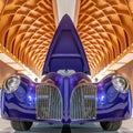 THE HAGUE/NETHERLANDS-JUNE 24, 2018: A spectacular purple concept car at a classic car meeting. The hood is opened for the public