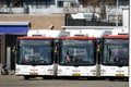 The Hague, The Netherlands - March 3 2023: White HTM Buzz Man passenger buses at bus stand remise Telexstraat