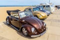 Classic beetle vehicles at the beach