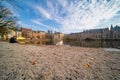 The Hague, The Netherlands - November 10, 2020: An almost abandoned park by the courtyard, one man, seagulls on the