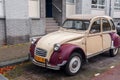 Vintage buggy or beetle car parked in a street in The Hague, Netherlands