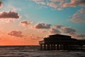 The Hague, Netherlands - September 5, 2019: Scheveningen beach. Pier at sunset. Silhouette. Royalty Free Stock Photo