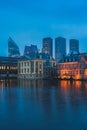 The Hague\'s Binnenhof with the Hofvijver lake and modern buildings at dusk, Den Haag, Netherlands