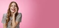 Haha so funny. Flirty coquettish attractive caucasian female laughing touching face feminine seduction gesture giggling Royalty Free Stock Photo
