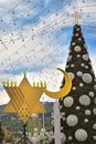 Christmas tree, Hanukkah menorah and crescent in Haifa, Israel