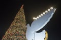 Decoratively decorated for Christmas celebrations tree and pigeon with Chanukah Menorah on the Sderot Ben Gurion street in Haifa