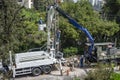 Electric company team working on a transmission tower