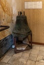 A medium sized bell stands as an exhibit in a museum of the Stella Maris Monastery which is located on Mount Carmel in Haifa city