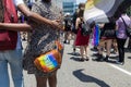 People with protest signs in preparation to the annual LGBTQ pride parade