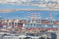 Haifa, Israel - October 2018: View of the harbor port of HaifÃÂ° and port cranes, cargo containers and ships in a sunny summer day