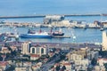 Haifa, Israel - October 2018: View of the harbor port of Haifa and port cranes, cargo containers and ships in a sunny summer day.