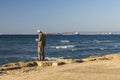 Haifa, An Orthodox man wearing a knitted kippah reads a prayer on the Jewish New Year Rosh Hashanah