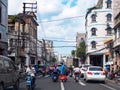 HAIKOU, HAINAN, CHINA - MAR 2 2019 - Motorists along Bo`ai Road, a historic street in Haikou city