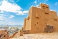 Hail city downtown and walls of Arabian Aarif fortress standing on the hill, Hail