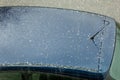 Hail falling over car roof. Hailstones can damage the bodywork Royalty Free Stock Photo