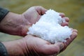 Hail in a hand after storm, climate change concept Royalty Free Stock Photo