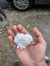 Hail ice in hand after a heavy storm Royalty Free Stock Photo