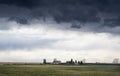 Hail storm forms above a country homestead on the Canadian prairies