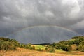 Hail storm and a rainbow