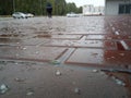 Hail in the street and parking, the floor is covered with icy hail Royalty Free Stock Photo