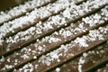 Hailstones on wooden bench Royalty Free Stock Photo