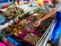 HAINAN, CHINA - 3 MAR 2019 Ã¢â¬â Fresh live seafood shellfish, oysters, mussels, clams for sale at a seafood wholesale and retail