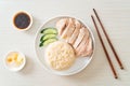 Hainanese chicken rice or rice steamed with chicken soup Royalty Free Stock Photo