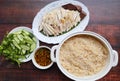 Hainanese chicken served with oily rice on the wood table