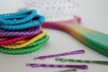 multi colored hair accessories for girls with hairbrush, and bobby pins Royalty Free Stock Photo