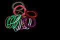 Hair accessories, colorful hair scrunchies isolated on black background