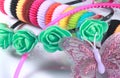 Hair bands with synthetic butterfly fashion background.