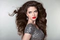 Hair. Beautiful Brunette Girl. Healthy Long Hair. Red lips. Fash Royalty Free Stock Photo