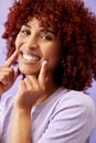 Hair, beauty and woman with hands on face in studio for natural, cosmetic or wellness on purple background. Haircare