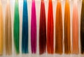 Hair bundles of different colors colorful in a row