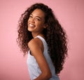 Hair care, portrait and woman in a studio with a natural, long and curly beauty salon hairstyle. Happy, smile and Royalty Free Stock Photo