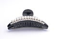 Hair clip with pearls  isolated on a white Royalty Free Stock Photo