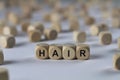 Hair - cube with letters, sign with wooden cubes